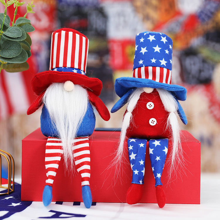 The Long-legged Faceless Doll Sits In A Plush Posture