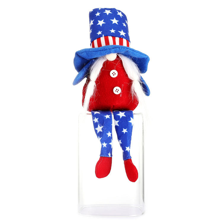 The Long-legged Faceless Doll Sits In A Plush Posture