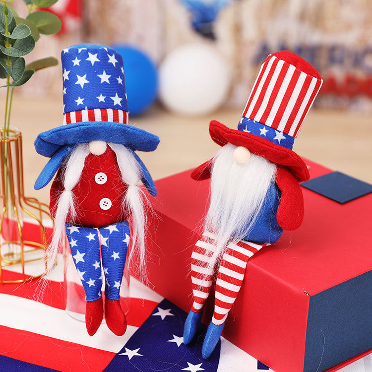 The Long-legged Faceless Doll Sits In A Plush Posture